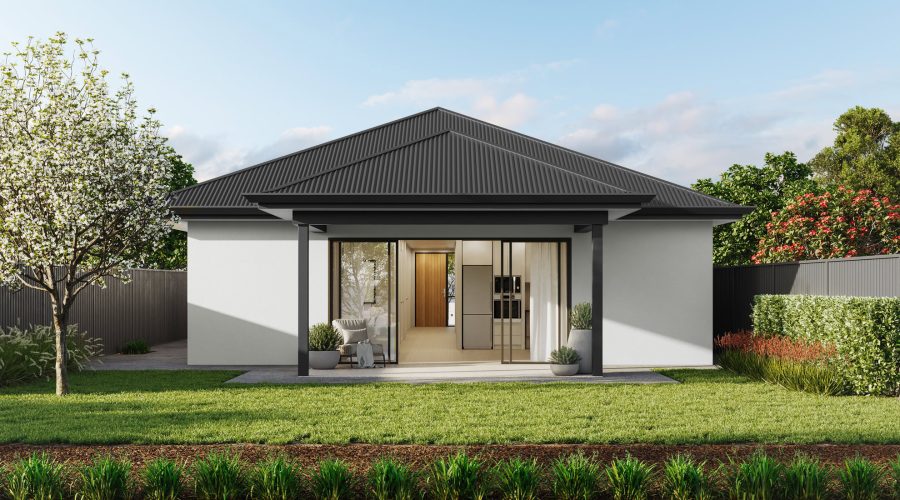 Modern house exterior with a black metal roof, white walls, and large glass sliding doors. A patio with outdoor seating overlooks a grassy yard with trees and shrubs.