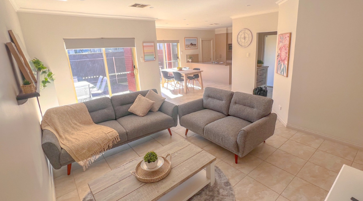 A living room with two couches and a coffee table.