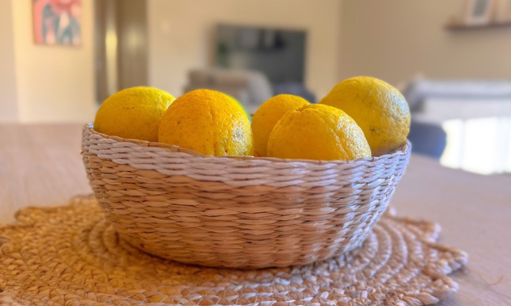 Lemons in a SIL wicker basket on a table in Suburb - SIL vacancy in Brighton