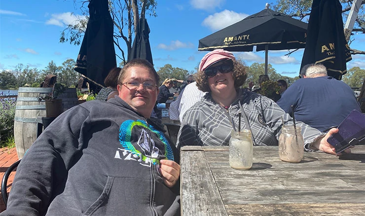 NDIS participants enjoying coffee at an Enhanced Lifestyles free customer event