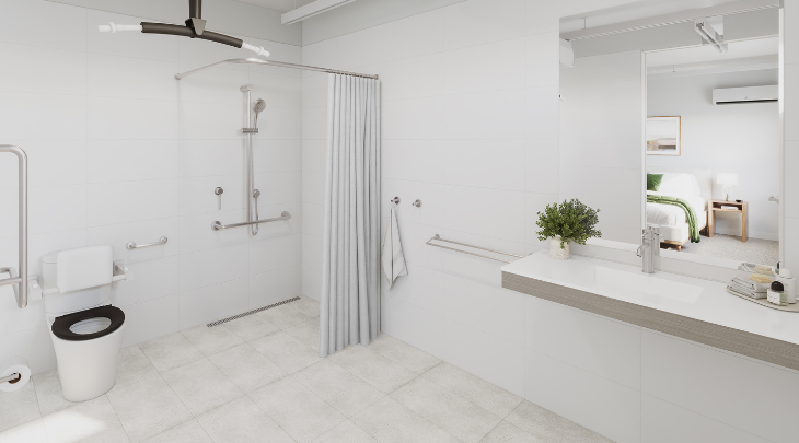 A white bathroom with a toilet, shower and sink.