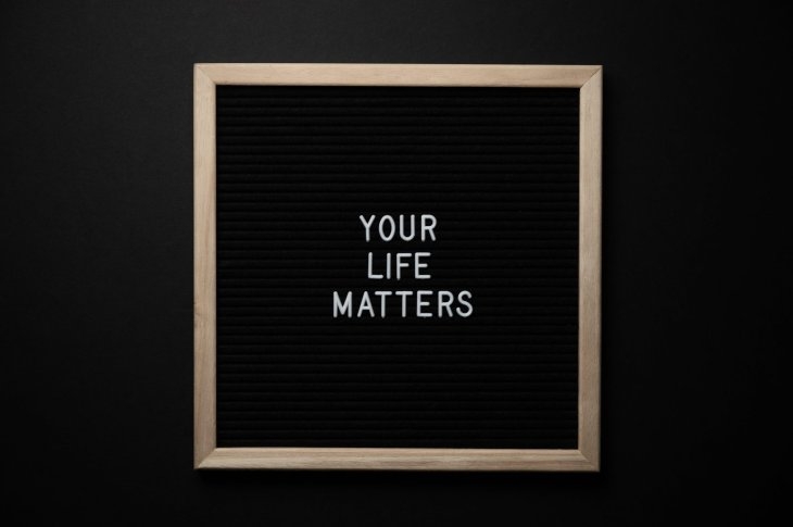 A black board with the words your life matters on it.