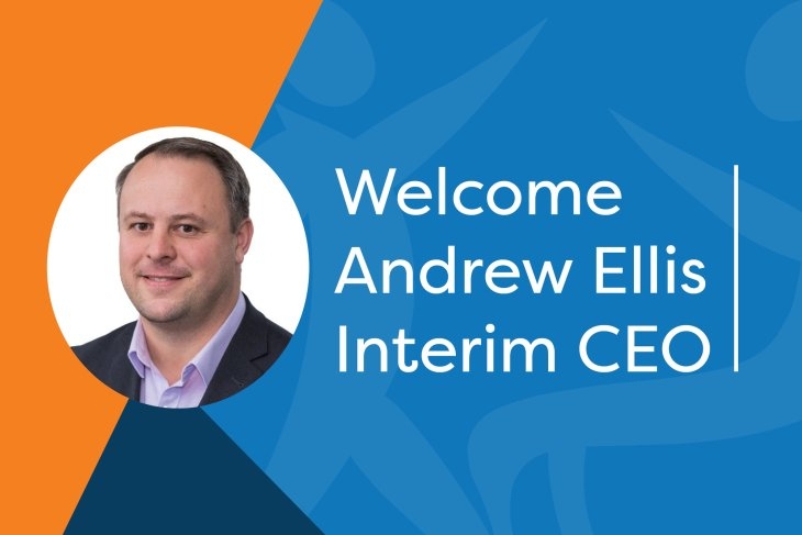 Andrew Ellis' photo on a blue and orange background with text in white saying "Welcome Andrew Ellis Interim CEO"