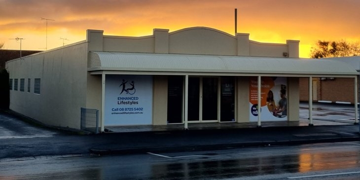 Our accessible office at 173 Commercial Street, Mount Gambier photographed soon after dawn with the sun just above the office, giving the sky a yellow tint.